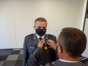 uczestnicy uroczystości wręczenia medali